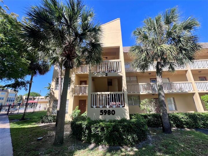 Property Photo: 5980 NW 64th Ave 201 FL 33319