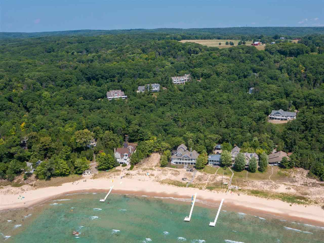 Property Photo:  8385 Seven Mile Point  MI 49740 