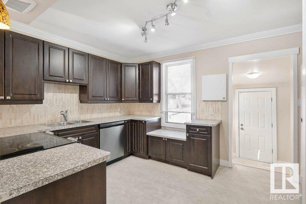 Property Photo:  11302 96 Street NW  AB T5G 1T3 