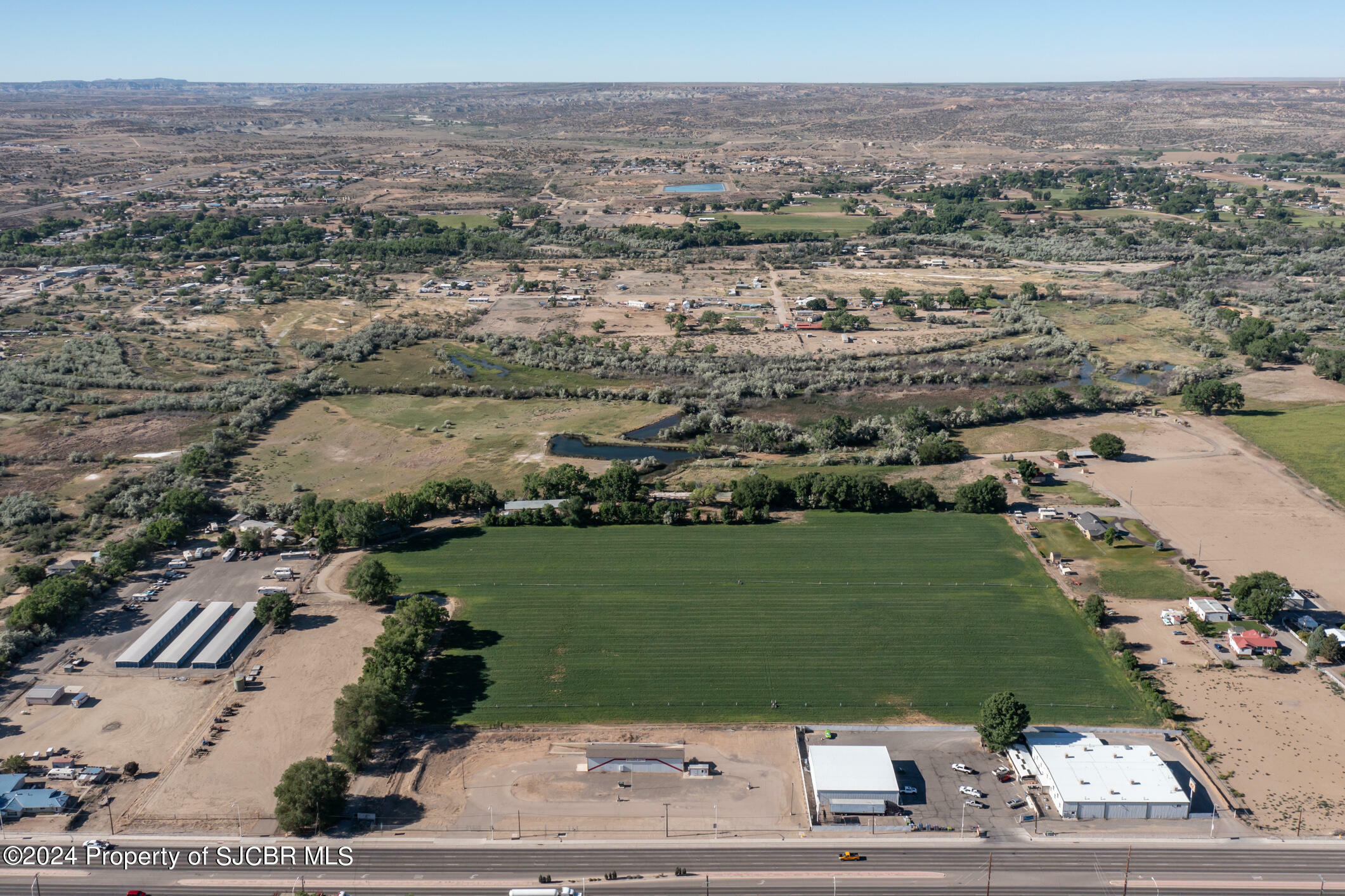 Property Photo:  1927/1929 W Broadway Avenue  NM 87413 