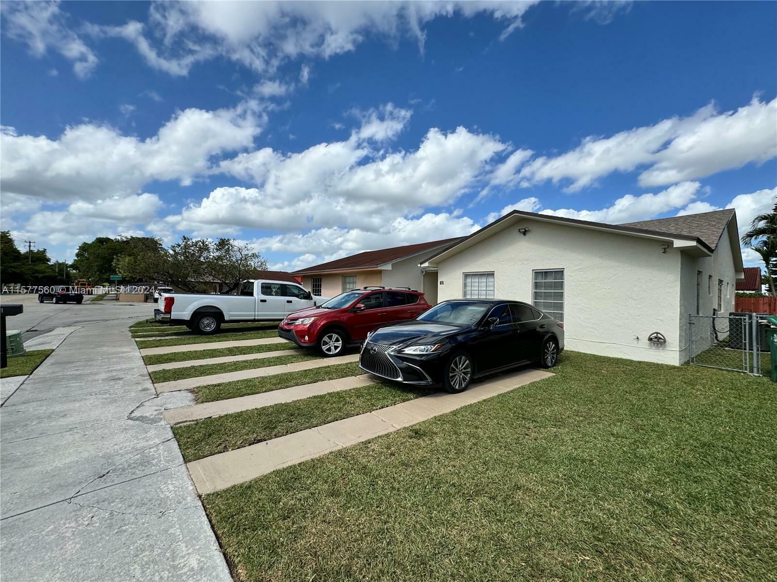 Property Photo:  61 NW 109th Ave 1-3  FL 33172 