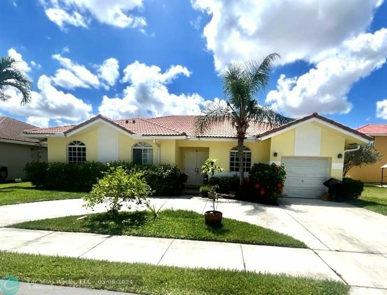 Property Photo:  7615 NW 99th Ter  FL 33321 