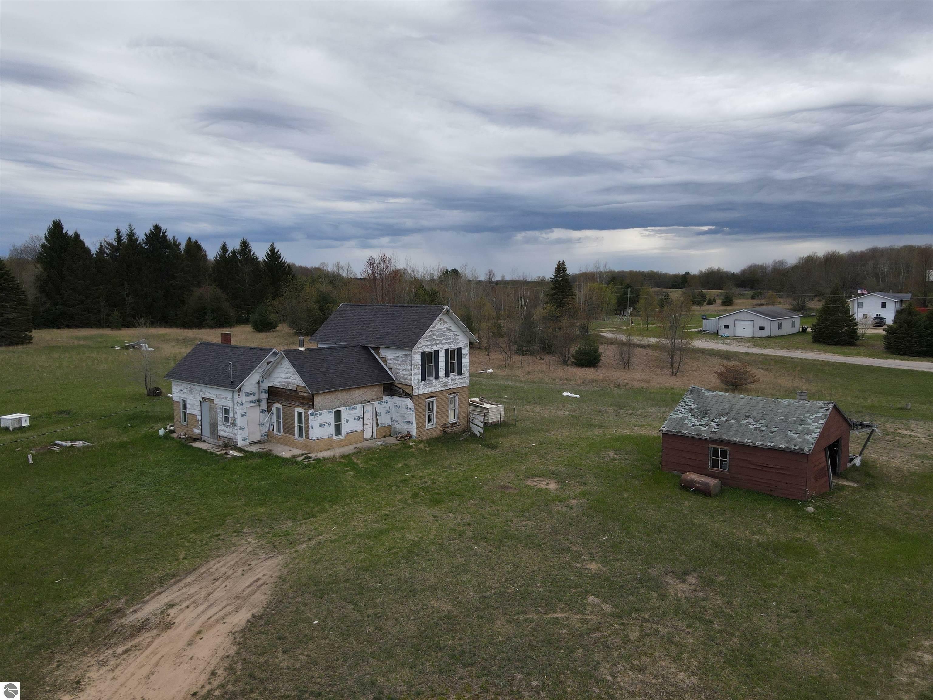 Property Photo:  395 Gregg Road  MI 49680 