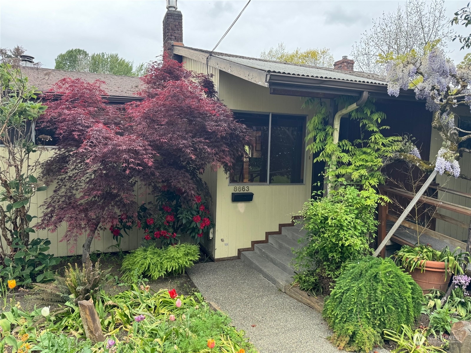 Property Photo: 8663 Island Drive S WA 98118