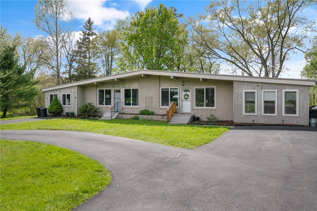 Property Photo:  1246 Warren Road  NY 14850 