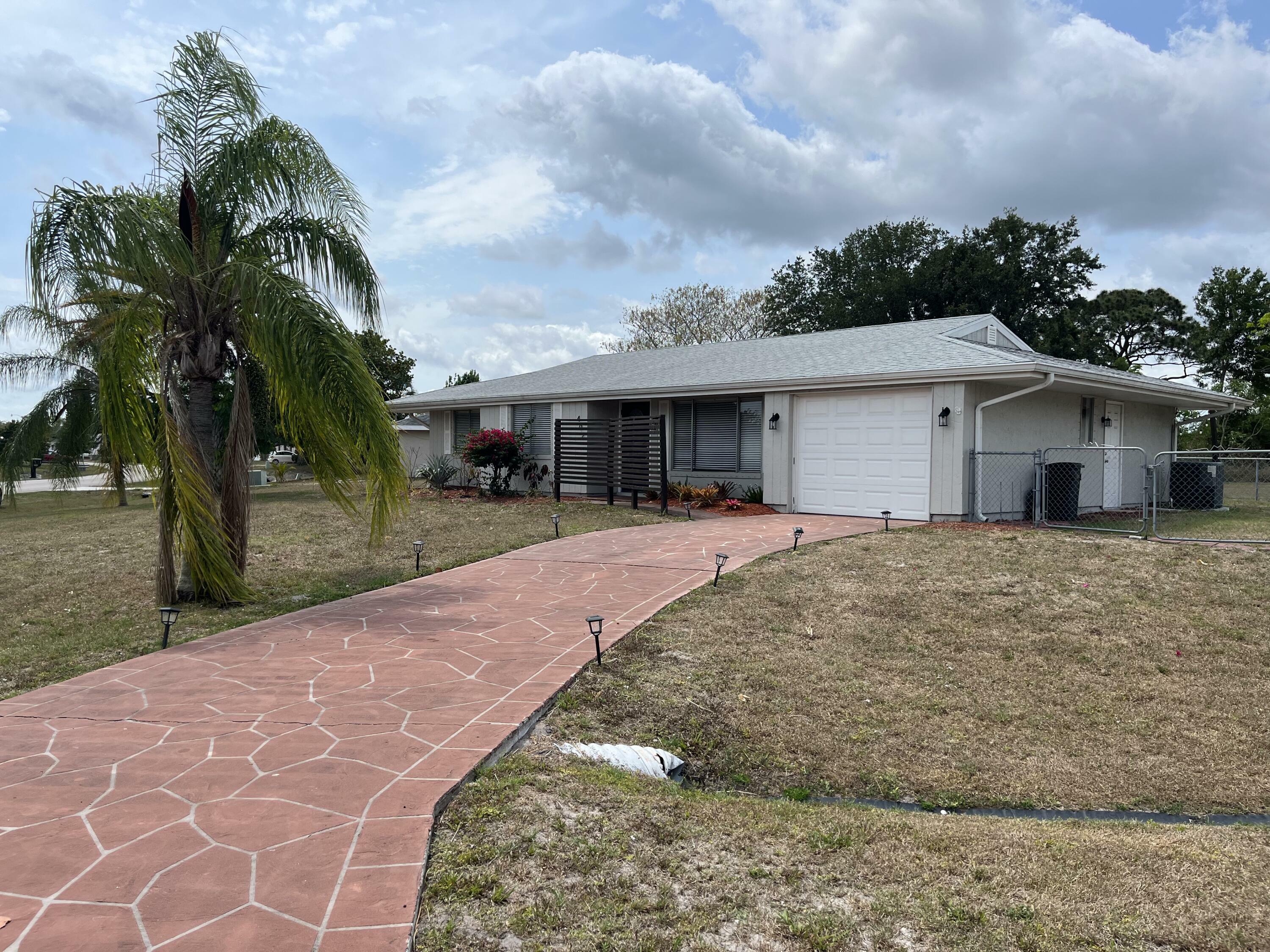 Property Photo:  402 SW College Park Road  FL 34953 