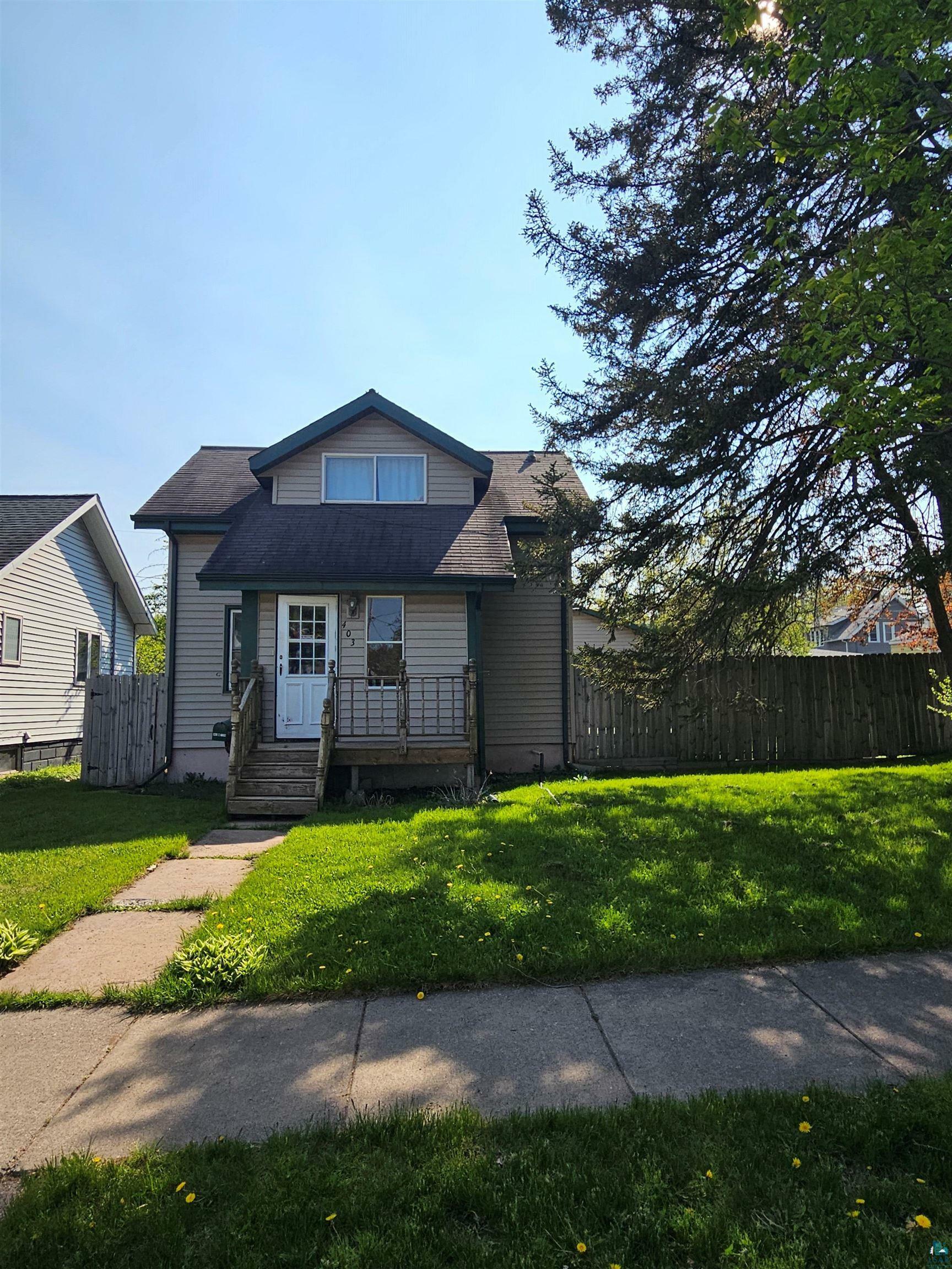 Property Photo:  403 N 77th Ave W  MN 55807 