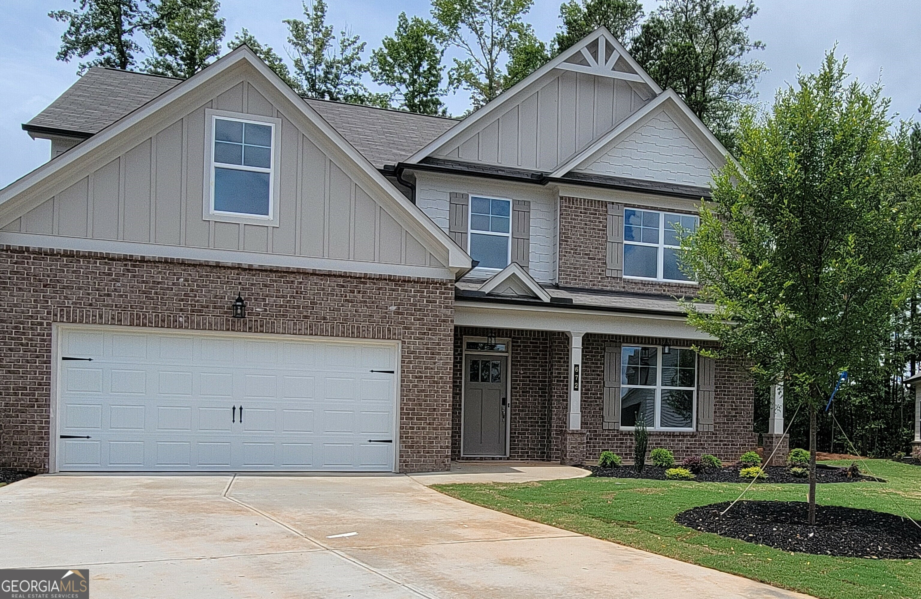 Property Photo:  672 Eagles Nest Circle  GA 30011 