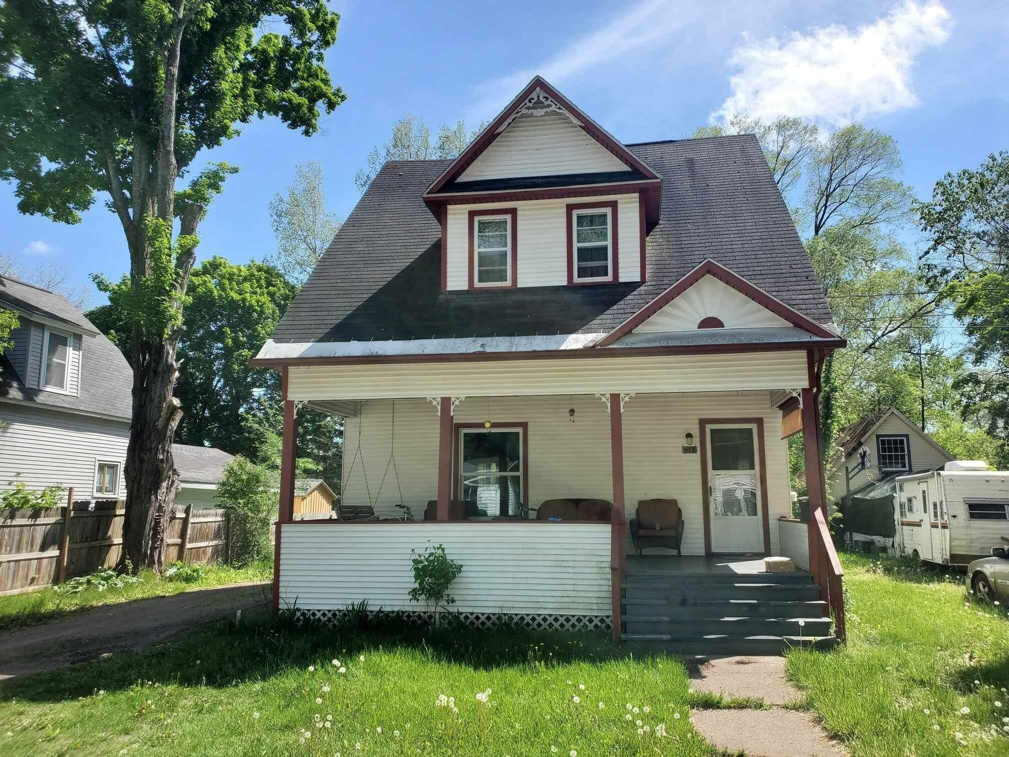 Property Photo:  618 Adams Street  MI 49712 