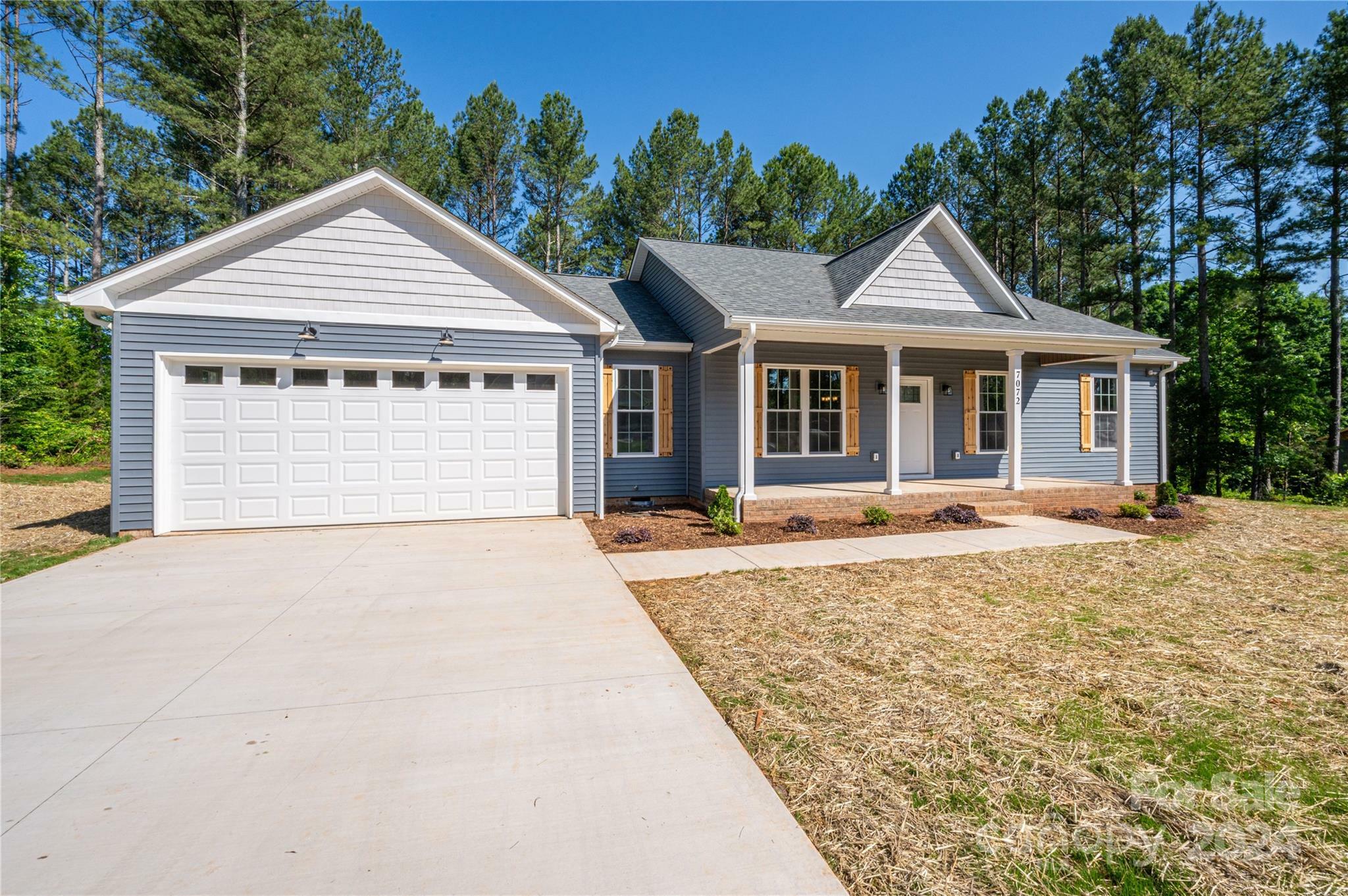 Property Photo:  7072 Sparrow Lane  NC 28168 