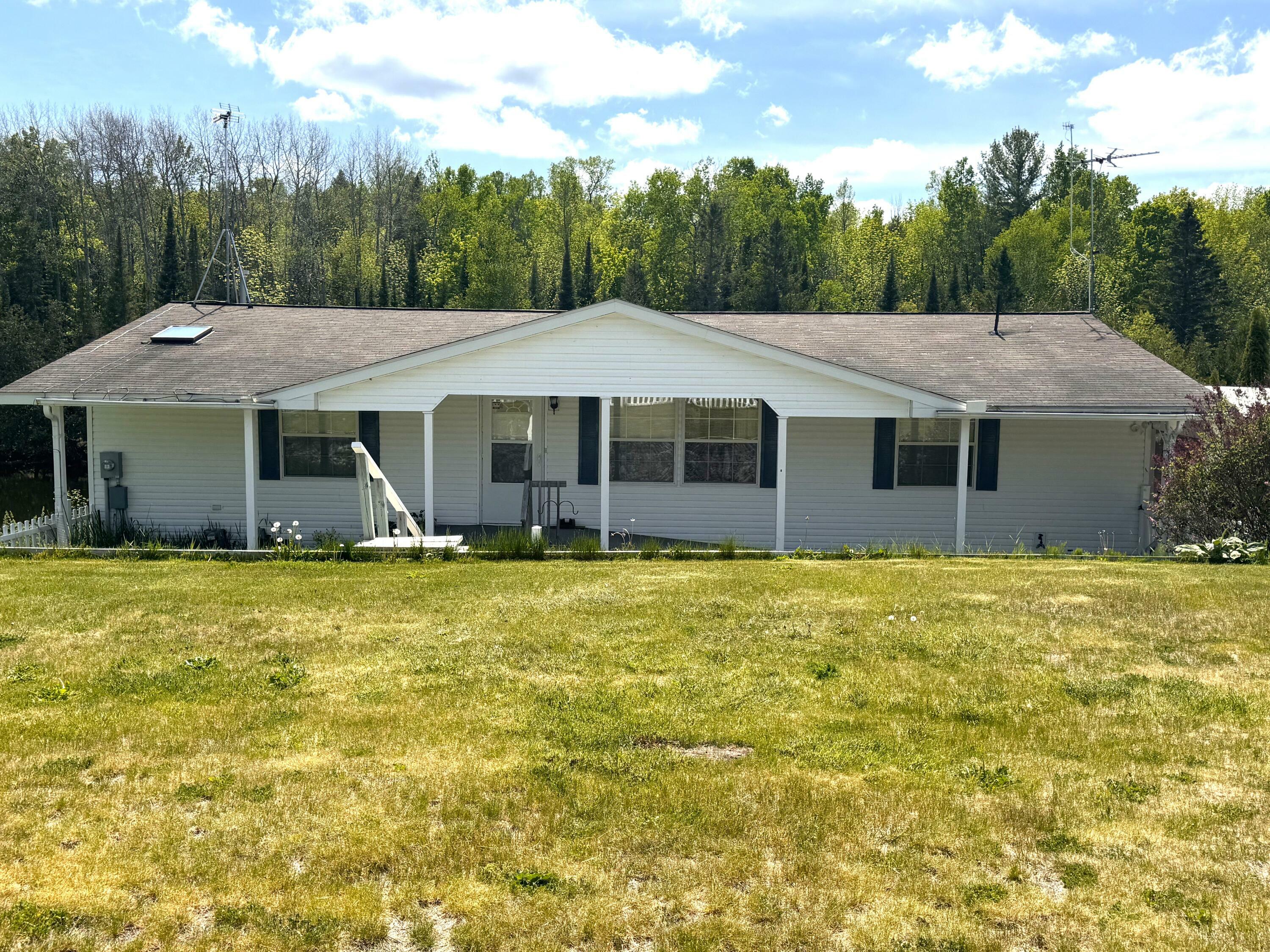 Property Photo:  4849 Betterly Drive  MI 49721 