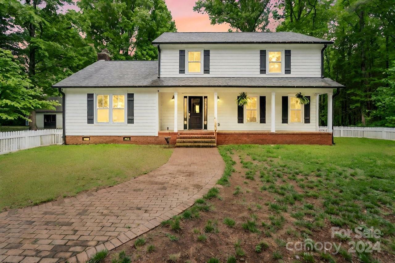 Property Photo:  15016 Rocky River Road  NC 28036 