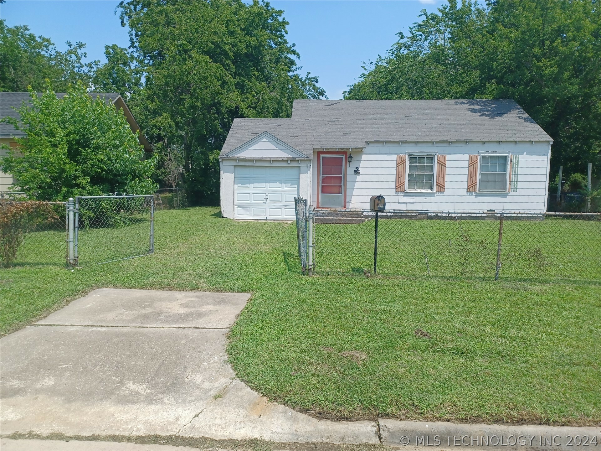 Property Photo:  307 E 27th Place N  OK 74106 