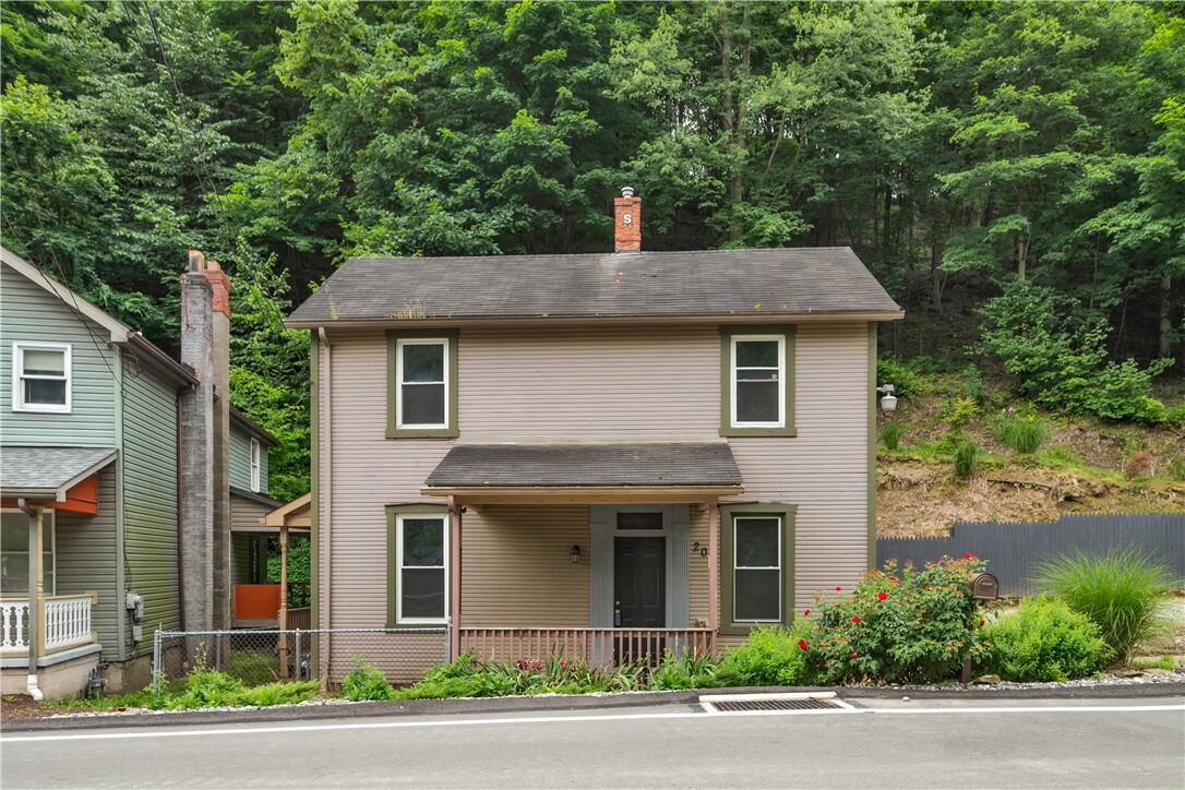 Property Photo:  203 Coal Valley Rd  PA 15025 