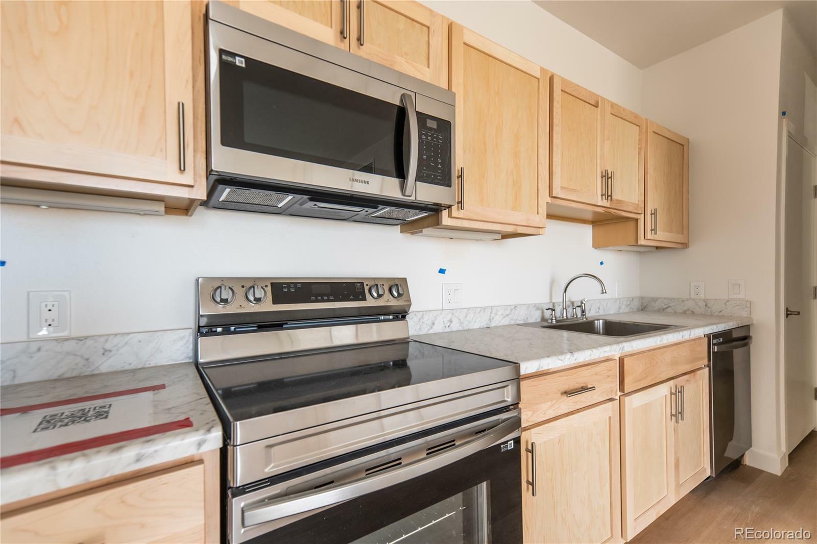 Property Photo:  5702 N Central Park Boulevard 306  CO 80238 