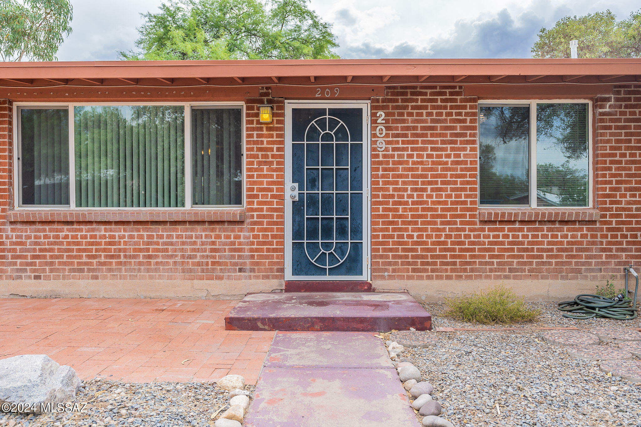 Property Photo:  209 N Rojen Court  AZ 85711 