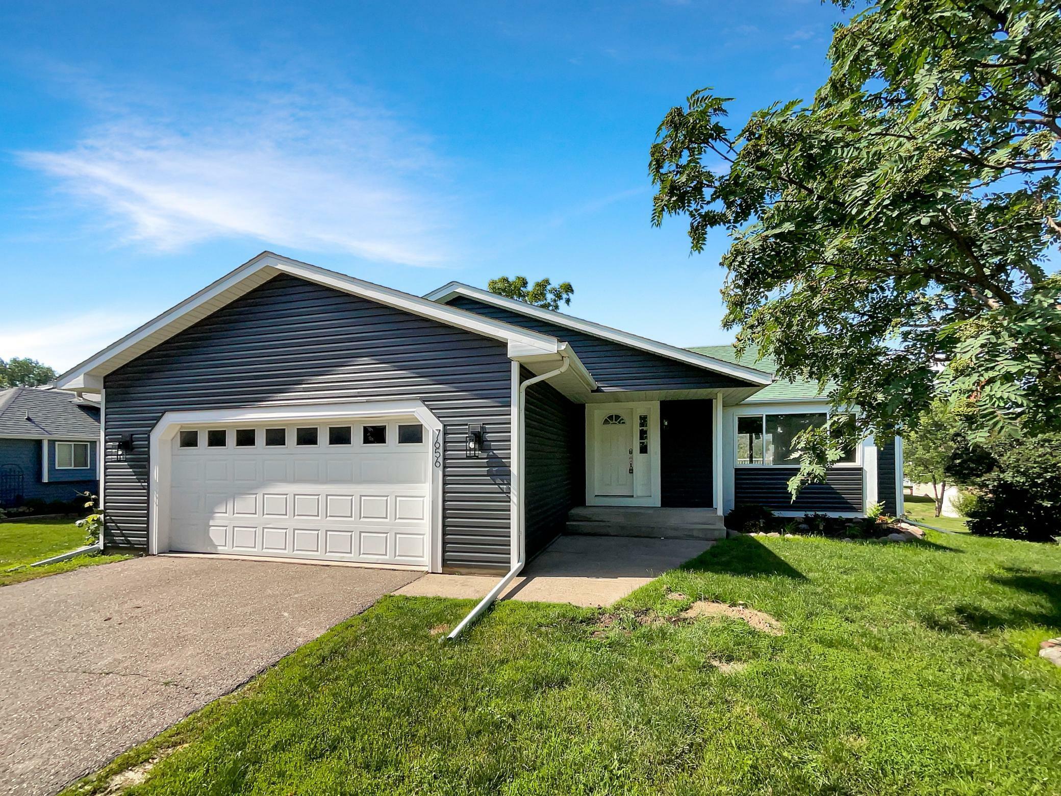 Property Photo:  7656 Upper 24th Street N  MN 55128 