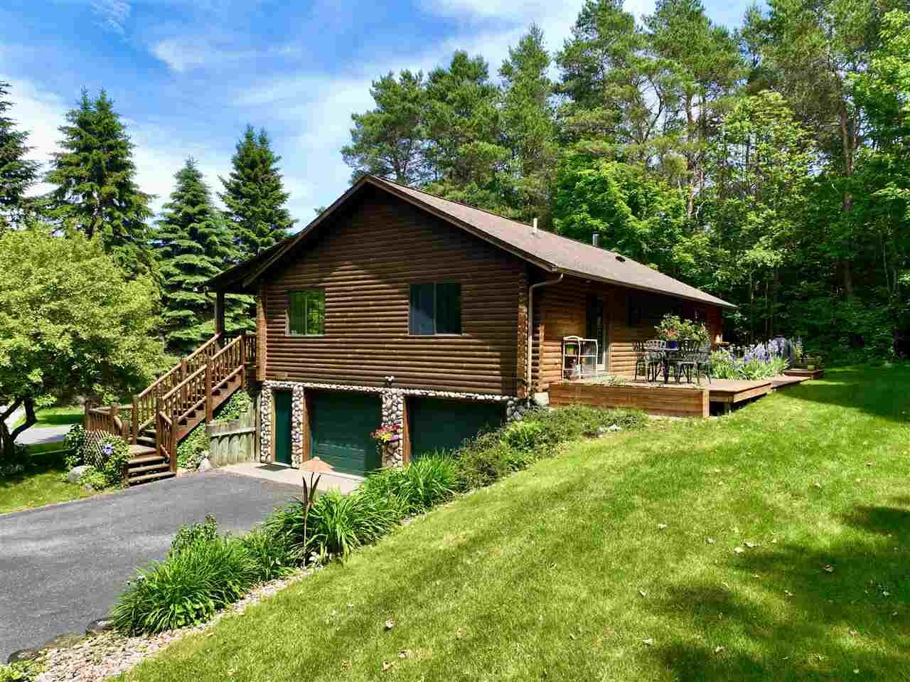 Property Photo:  6881 Bay Shore  MI 49720 