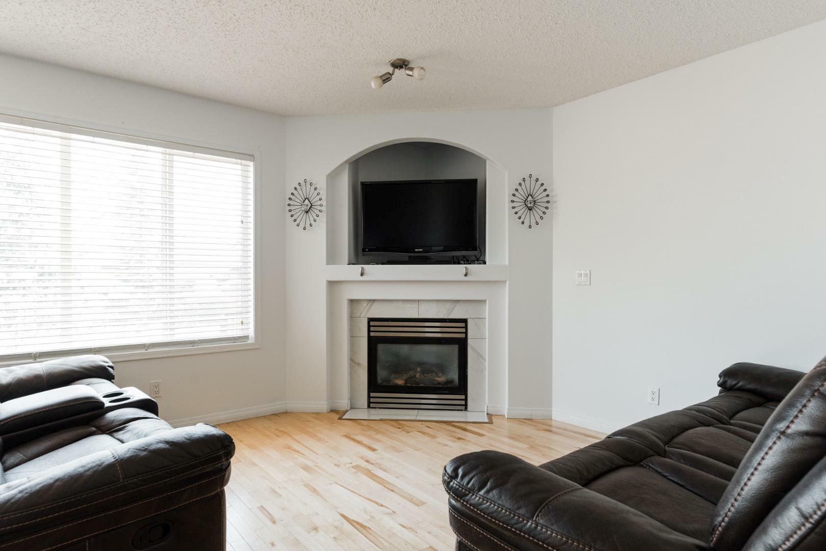 Property Photo:  129 Cinnamon Street  AB T9K 2R9 