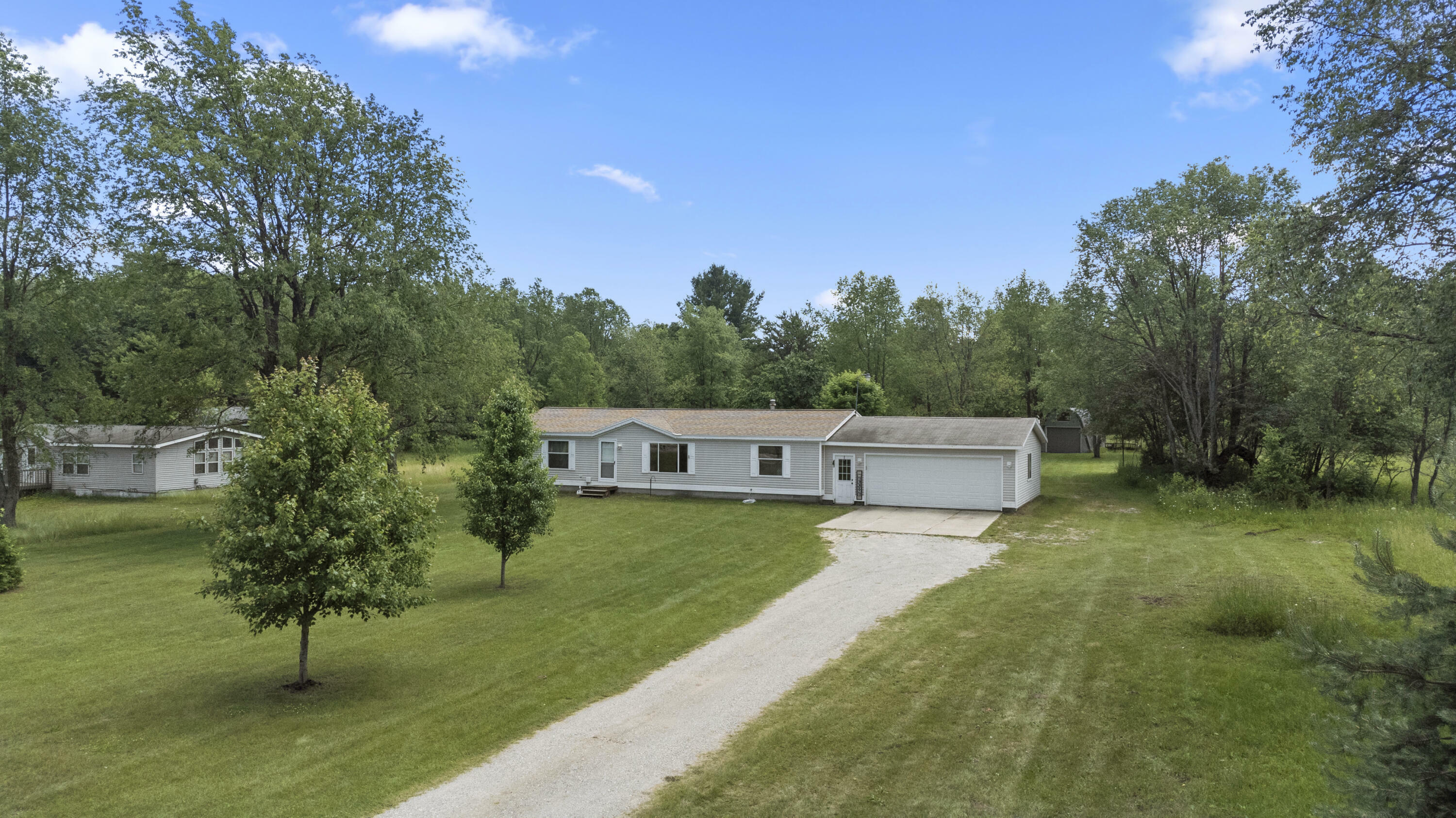 Property Photo:  10559 W Rosted Road  MI 49651 