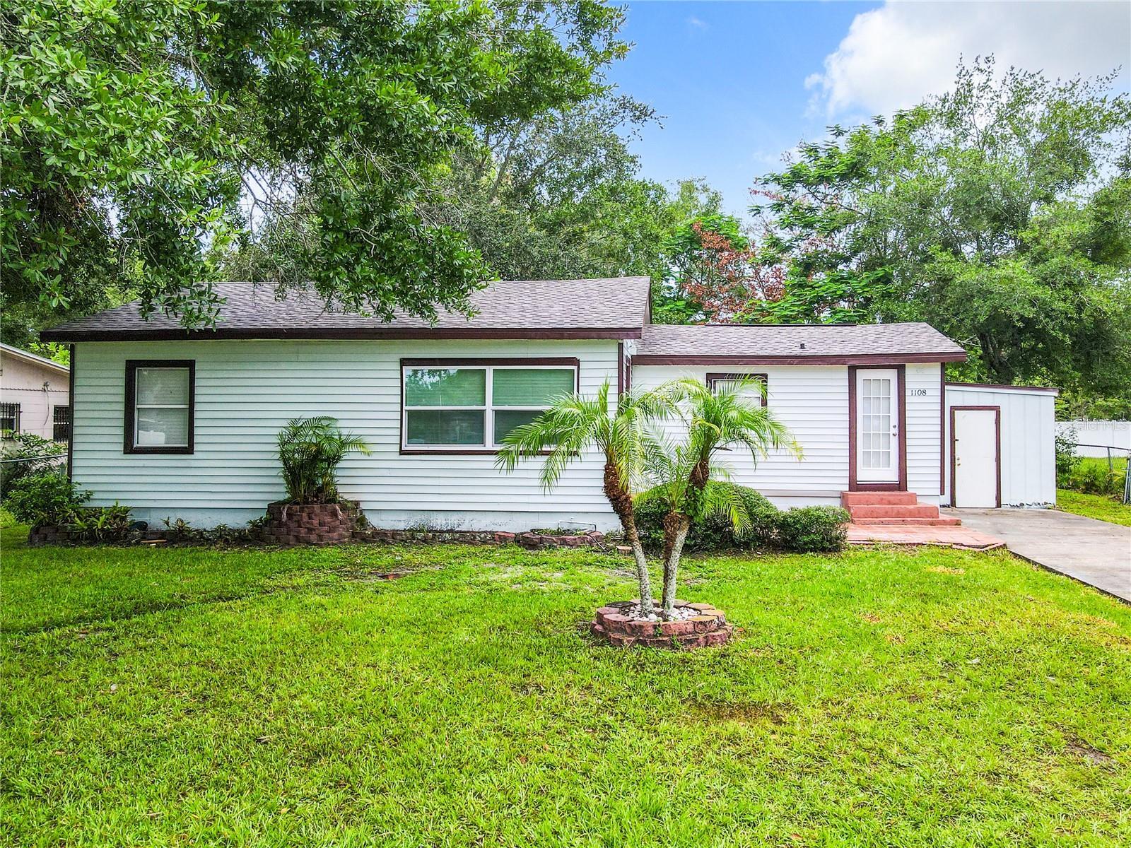 Property Photo:  1108 N Palm Ave  FL 34741 