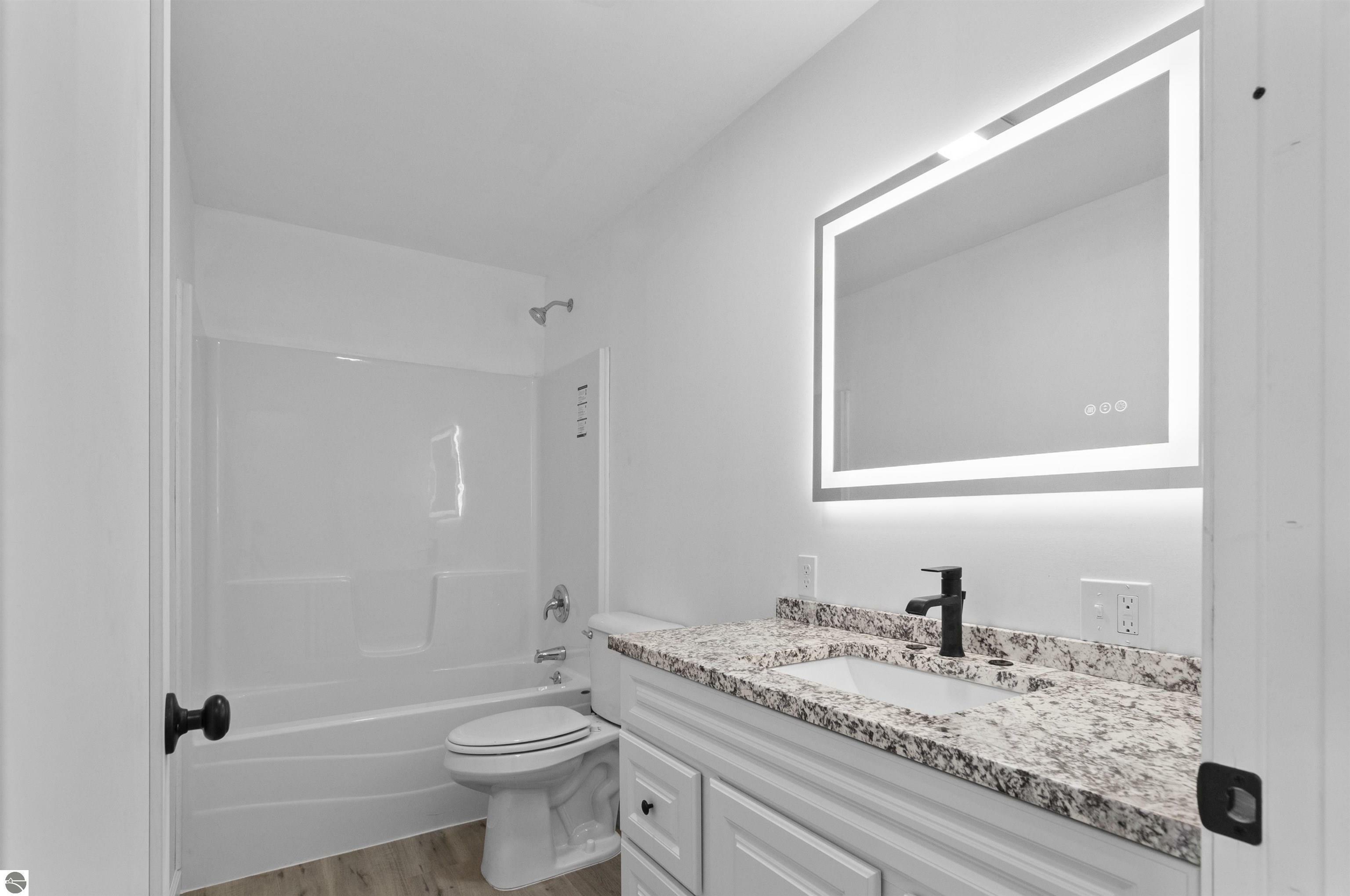 Property Photo:  202 Sabina Street  MI 49657 