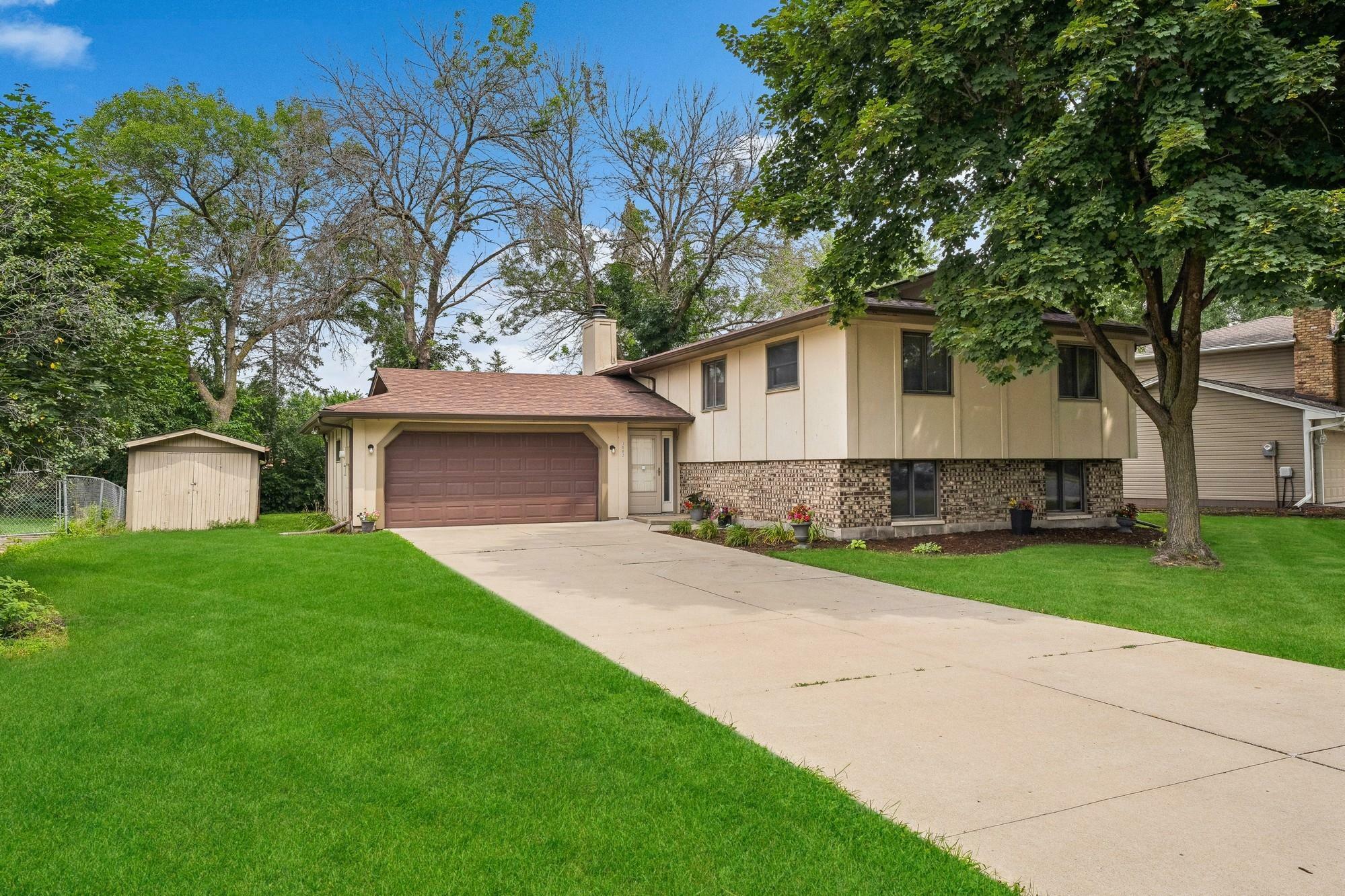 Property Photo:  3002 82nd Circle N  MN 55444 