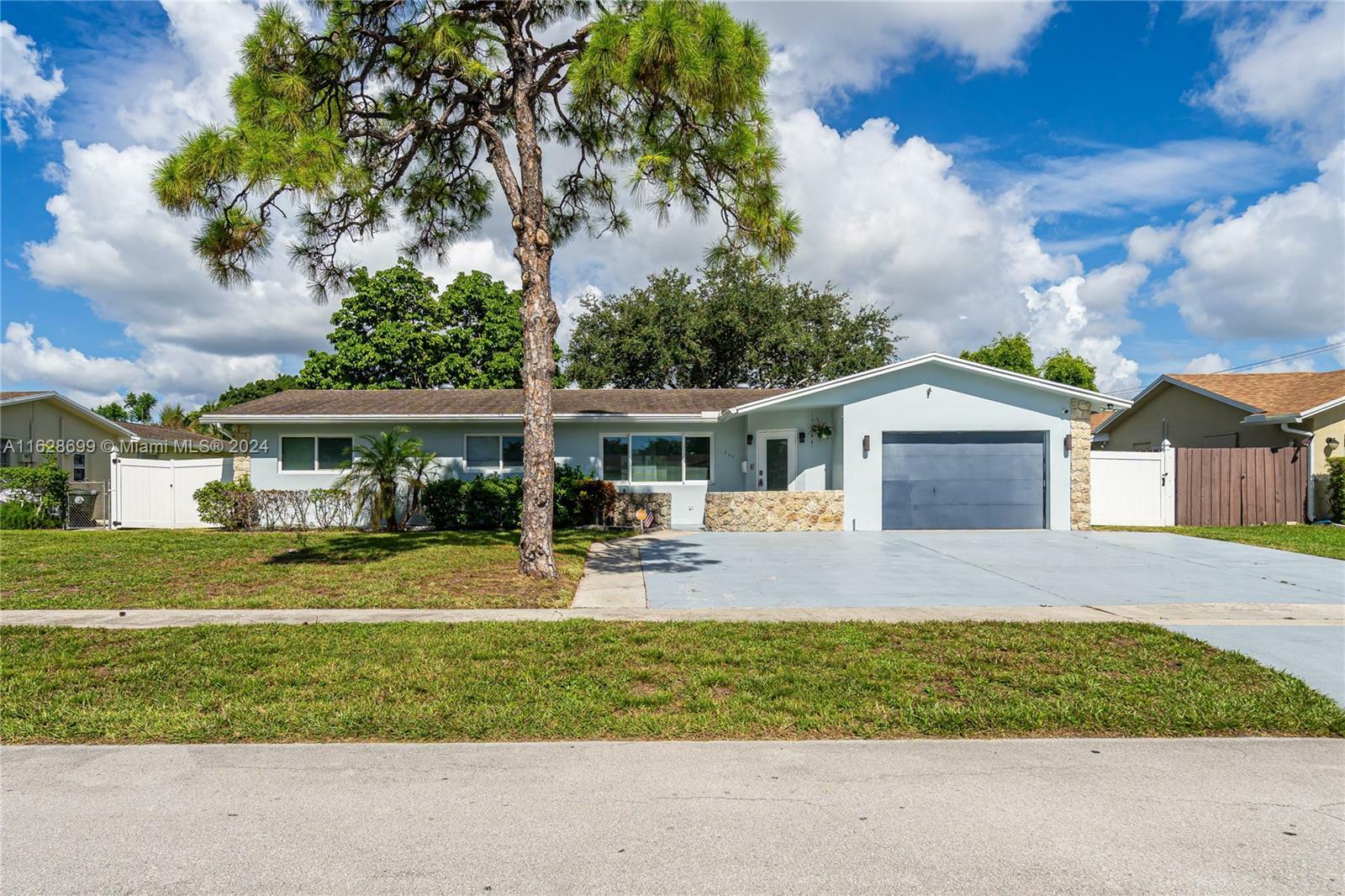 Property Photo:  551 NW 42nd Ave  FL 33066 