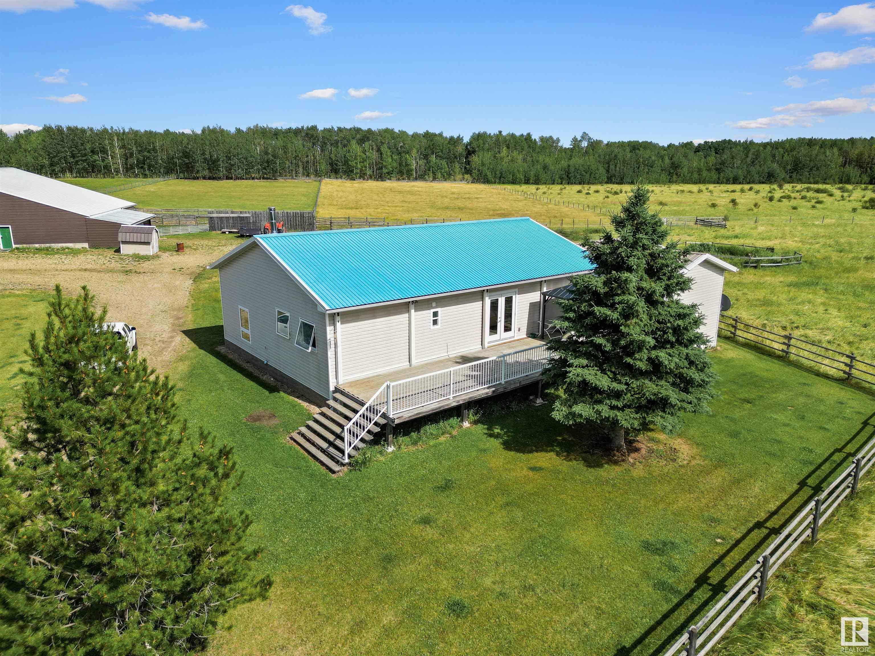 Property Photo:  452057 Rge Rd 70A  AB T0C 0A0 