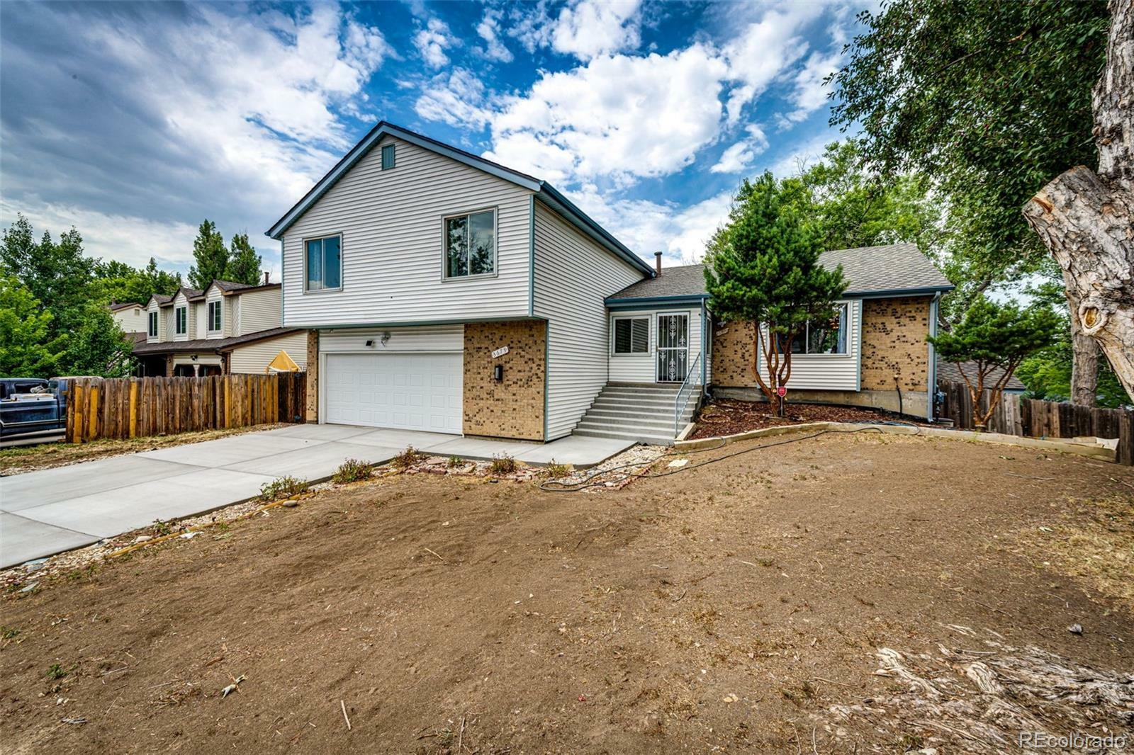 Property Photo:  3679 S Zeno Way  CO 80013 