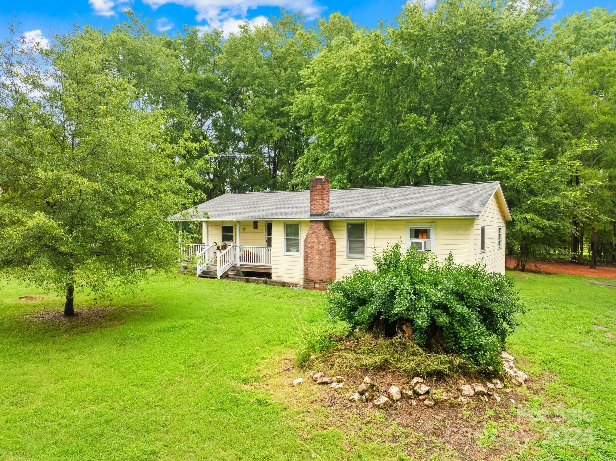 Property Photo:  7215 S Rocky River Road  NC 28112 