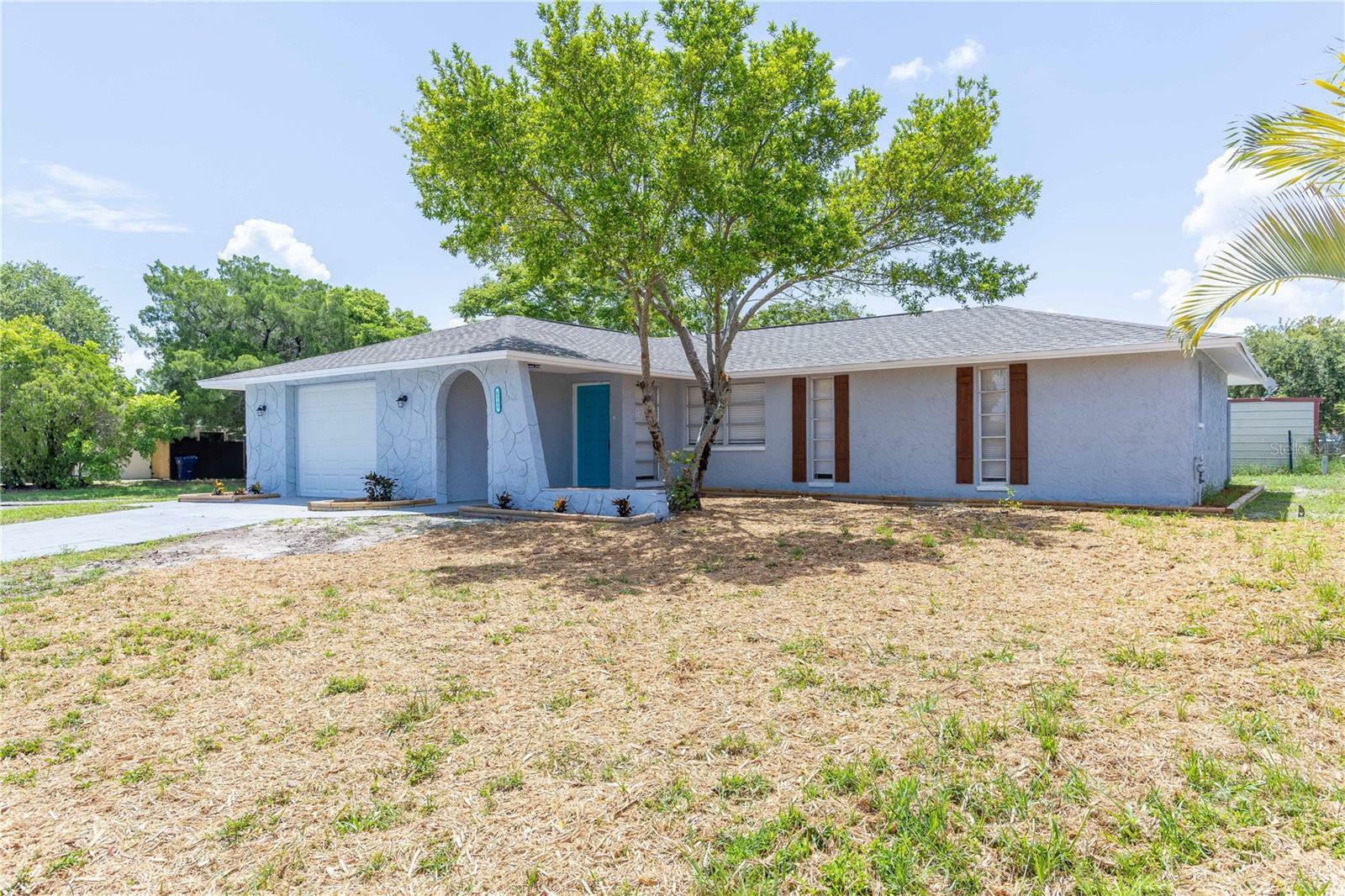 Property Photo:  6548 Lenoir Drive  FL 34668 