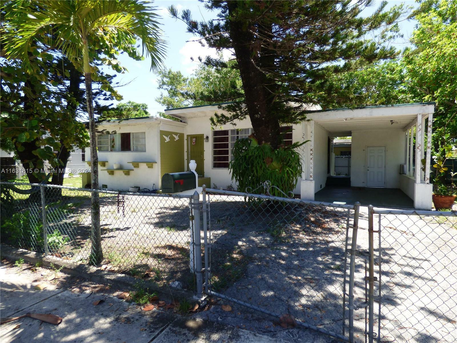 Property Photo:  590 NW 124th St  FL 33168 