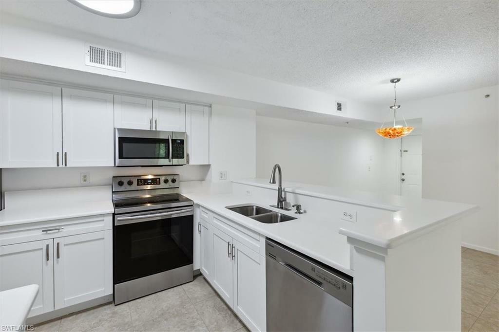 Property Photo: 1885 Florida Club Dr 8102 FL 34112