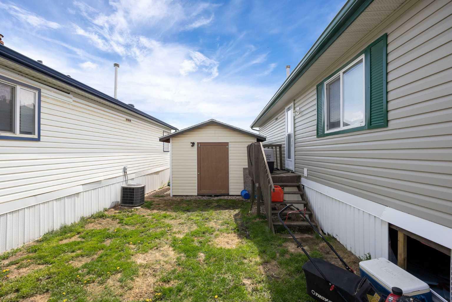 Property Photo:  209 Waterhouse Street  AB T9K 2T1 