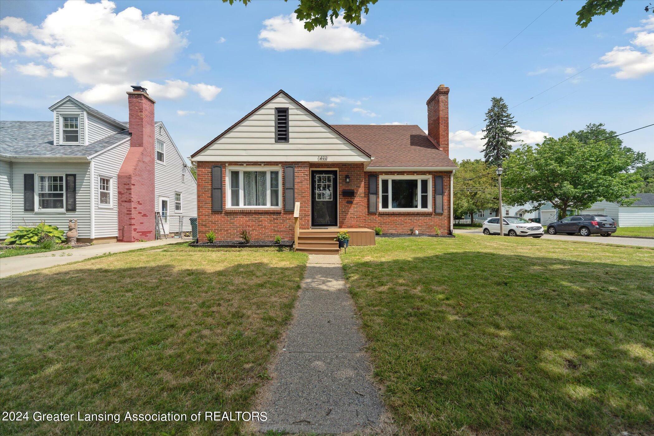 Property Photo:  1423 Pattengill Avenue  MI 48910 