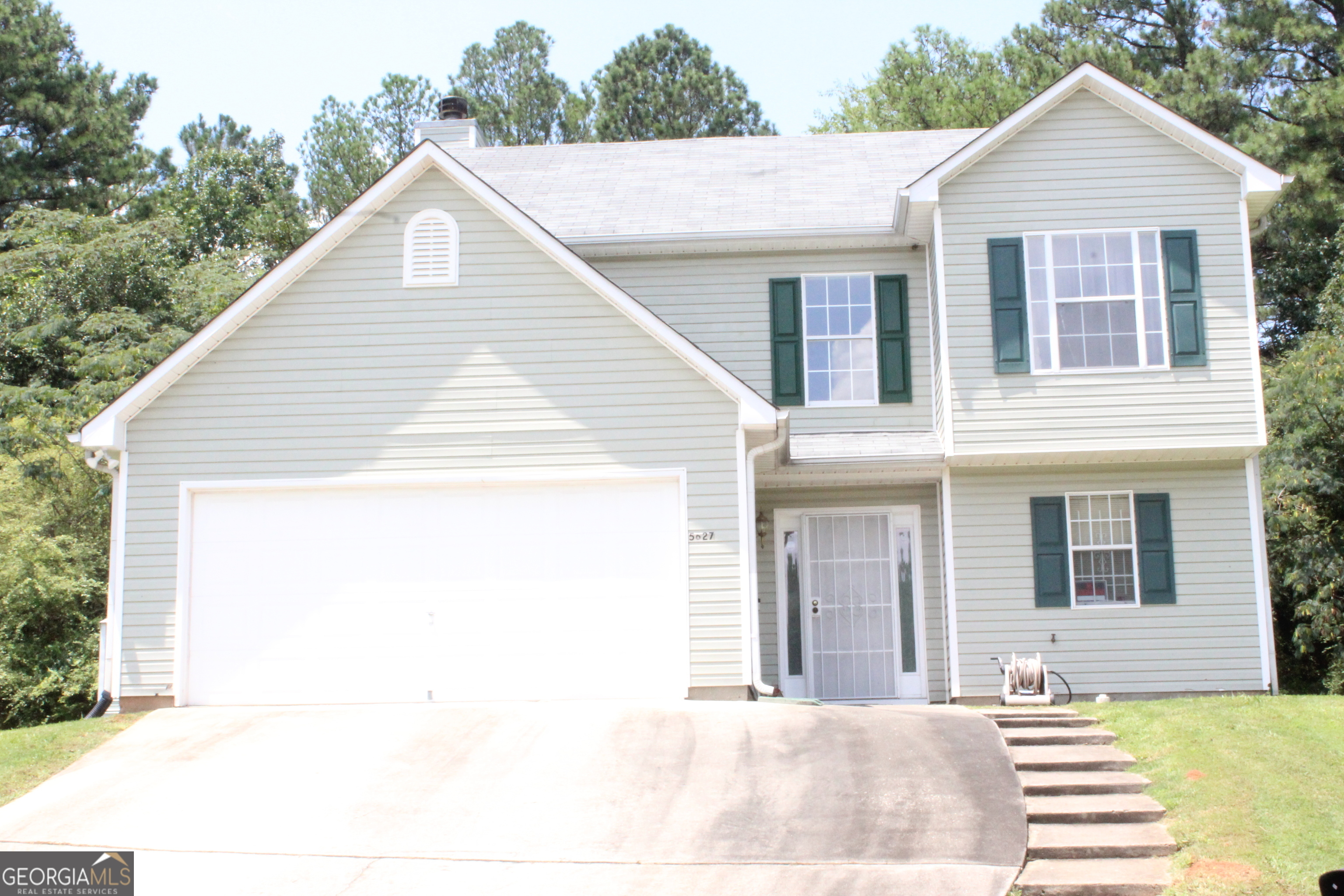 Property Photo:  5627 Isleworth Court  GA 30349 