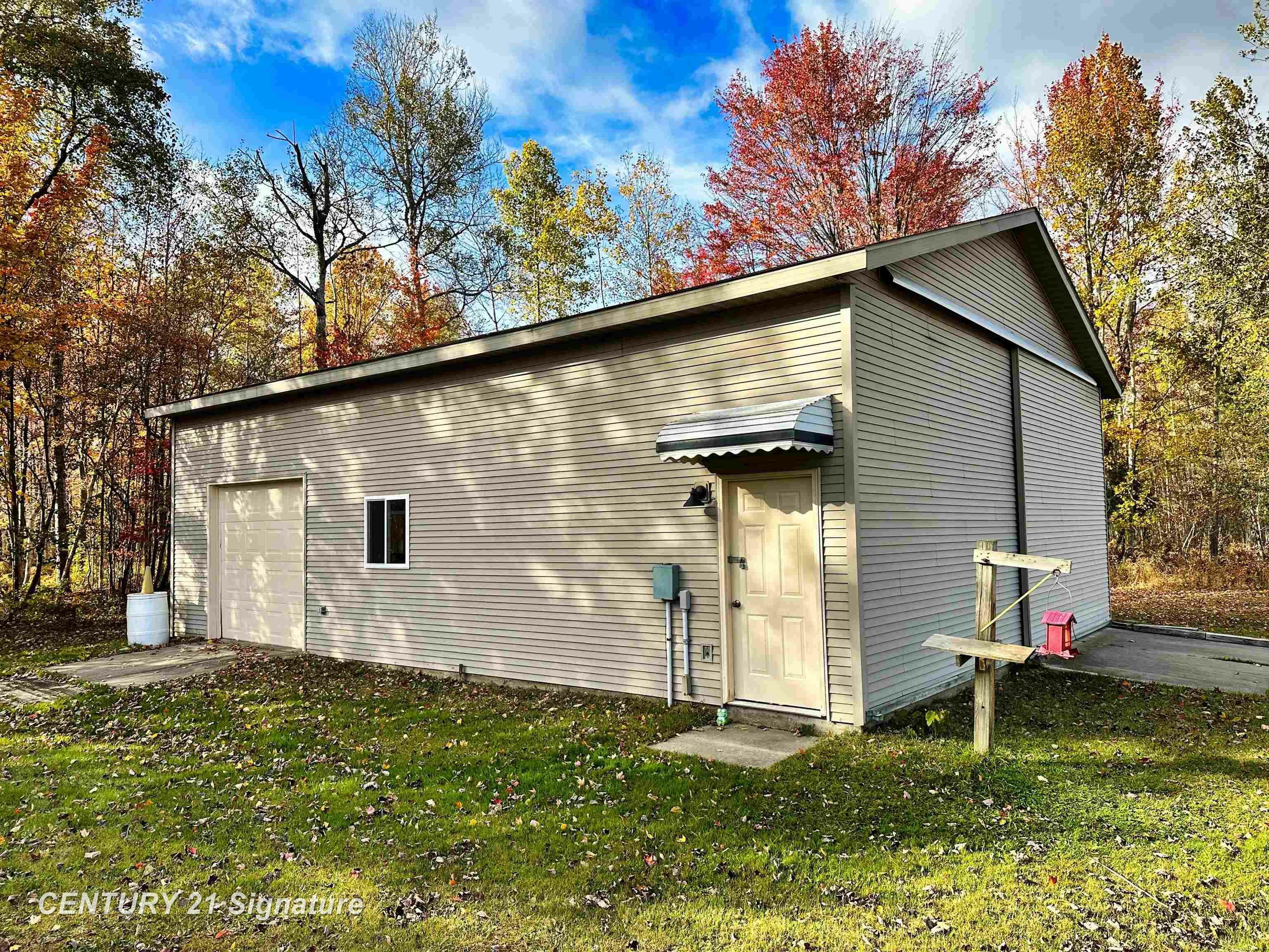 Property Photo:  6719 N Coleman Road  MI 48618 