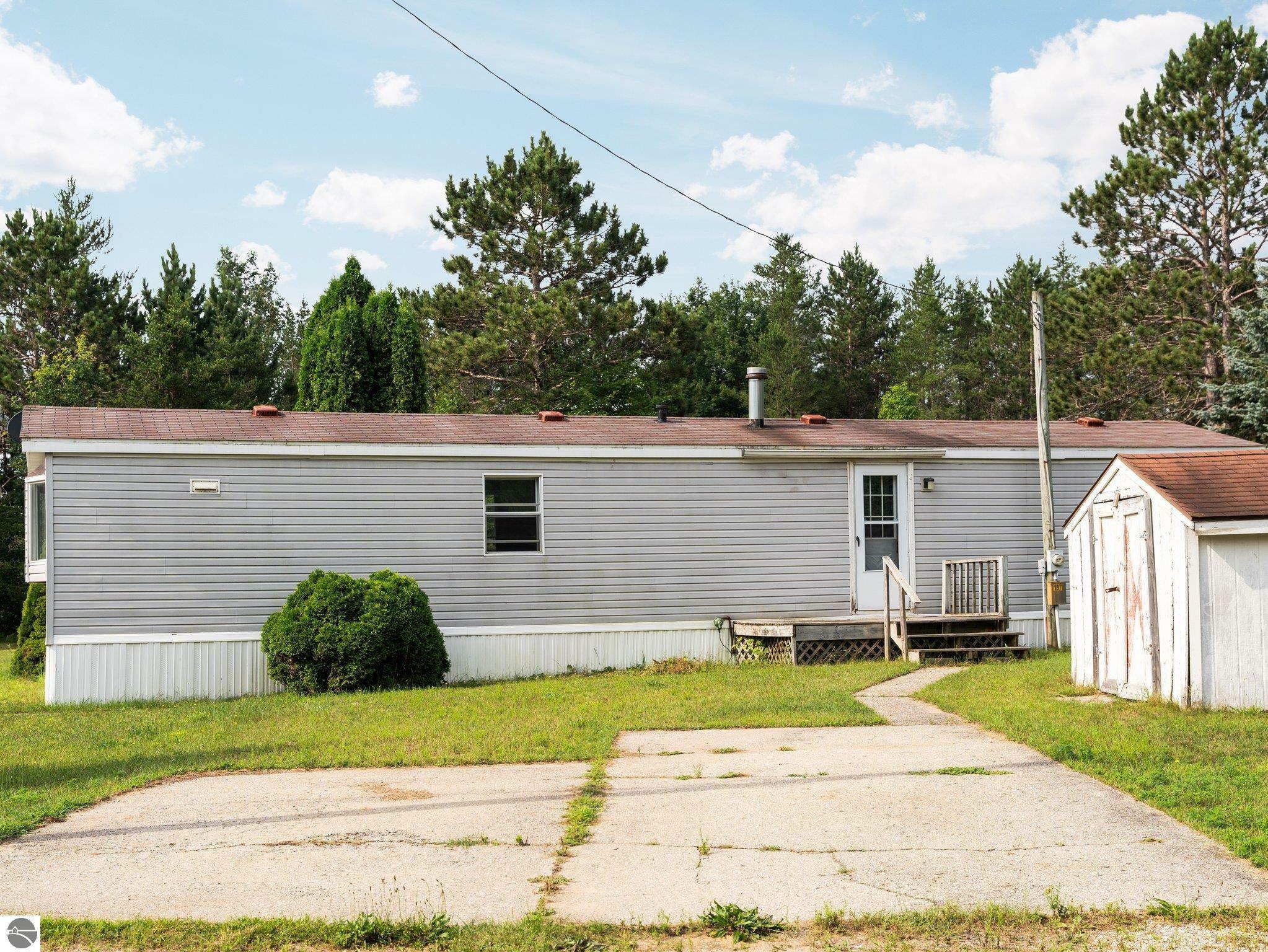 Property Photo:  187 Yellow Pine Circle  MI 49601-8405 