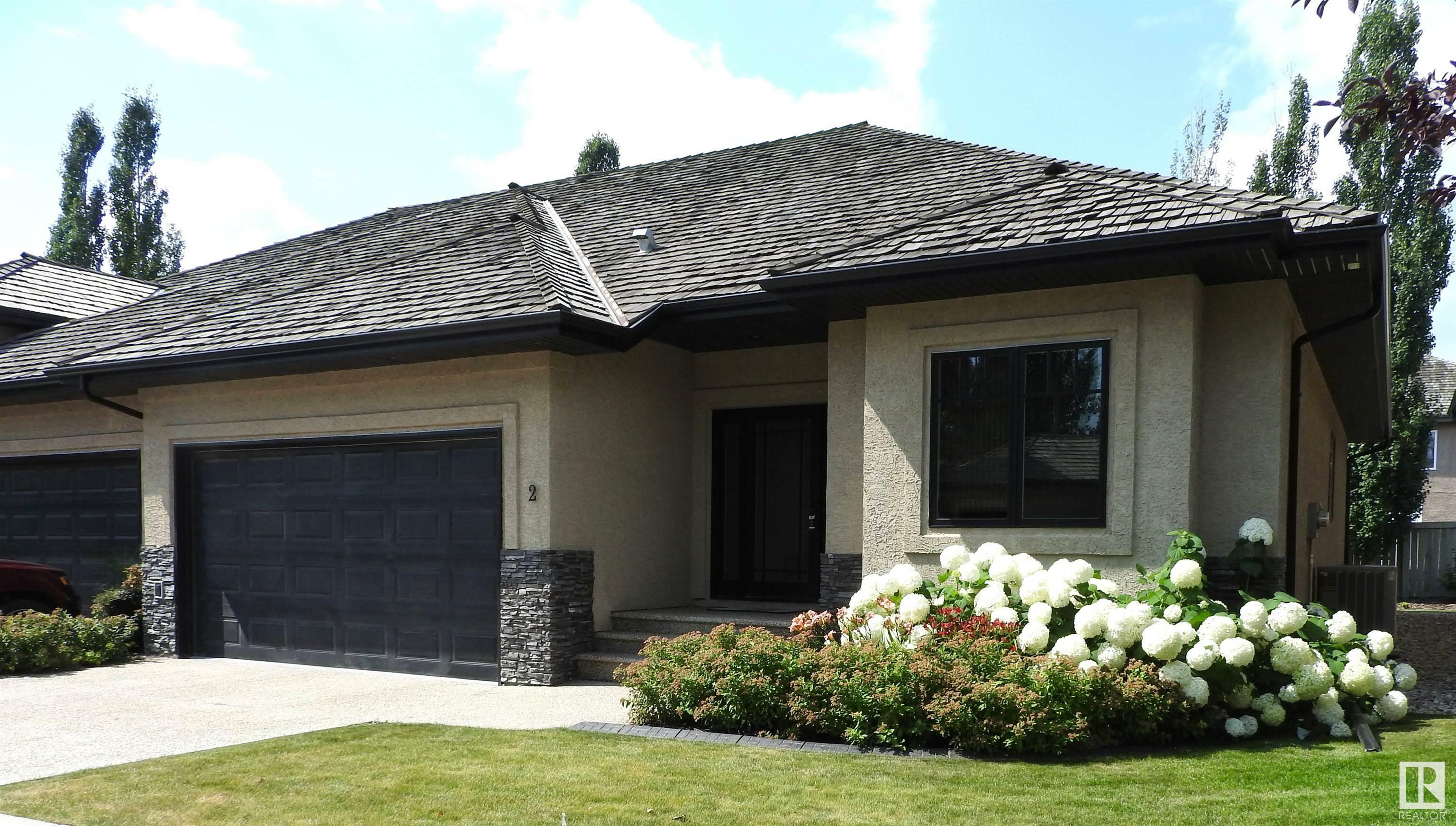 Property Photo:  4058 Mactaggart Drive NW 2  AB T6R 0R4 