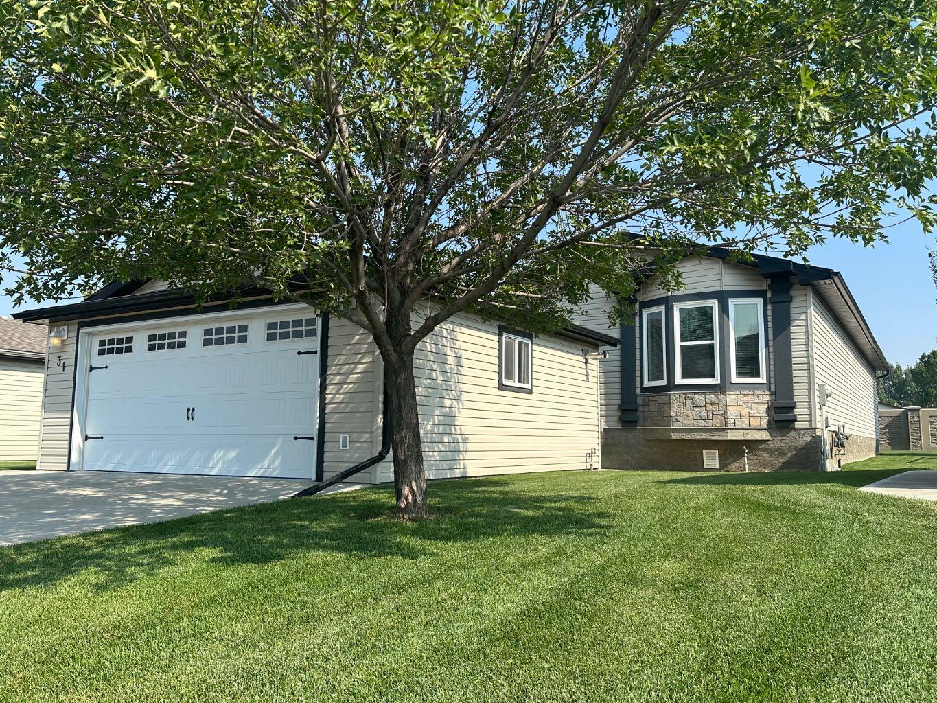 Property Photo: 31 Timothy Way SE AB T1B 0M7
