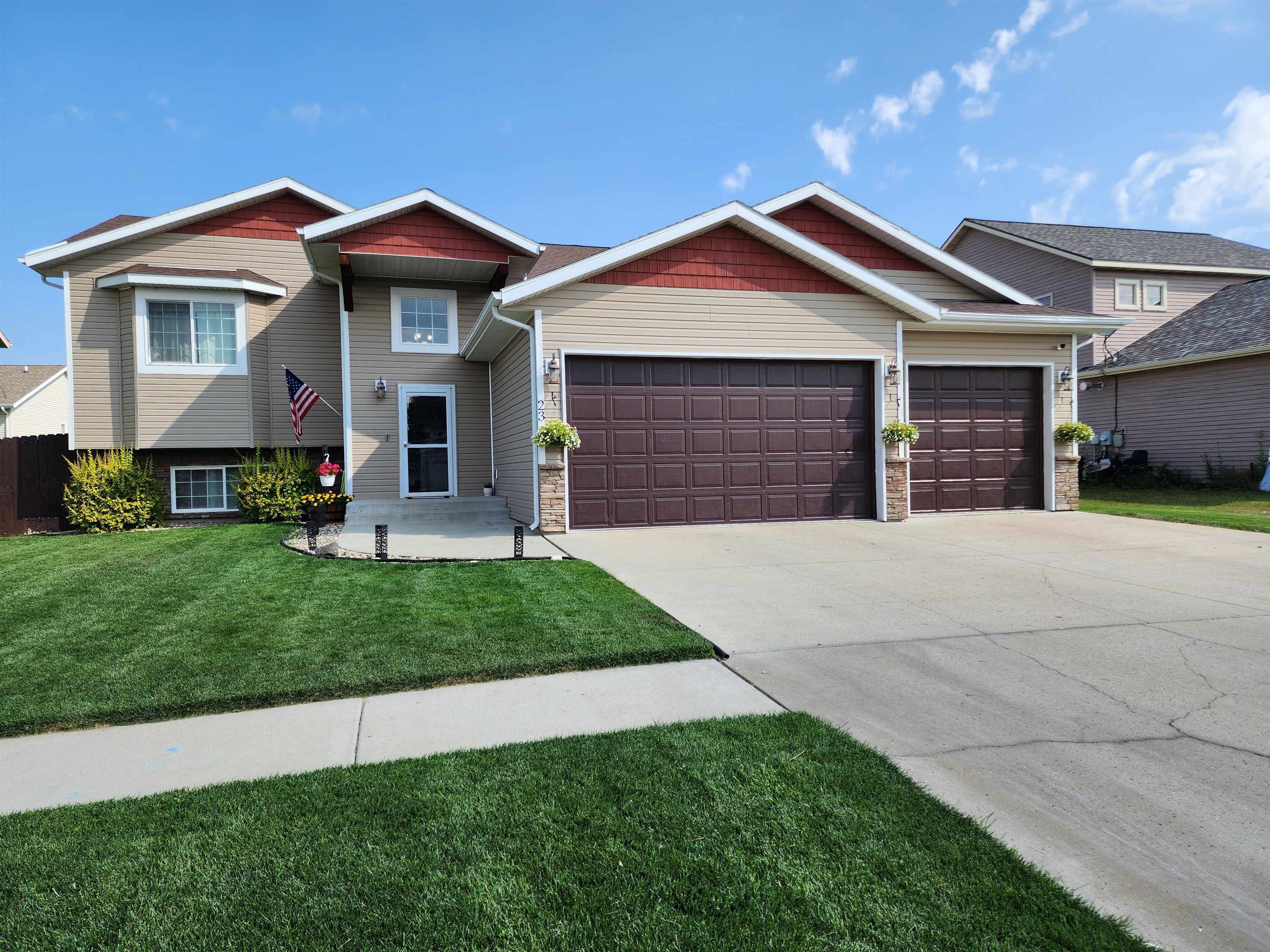 Property Photo:  23 Harmony Blvd.  ND 58785 