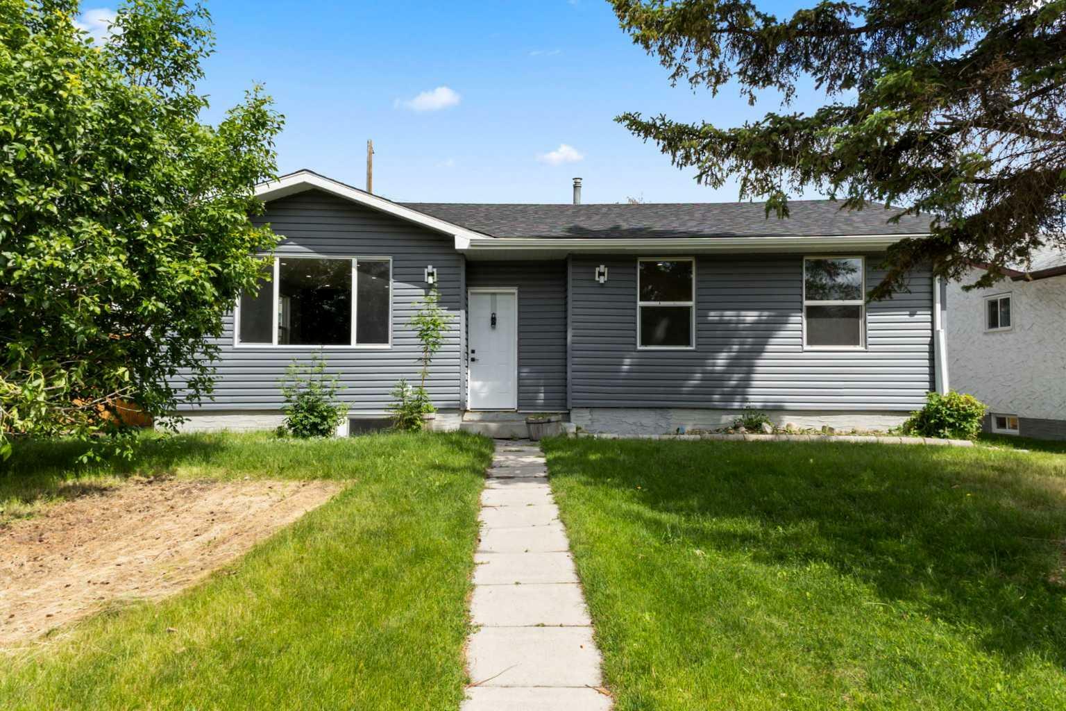 252 Queensland Drive SE  Calgary AB T2J 3R8 photo