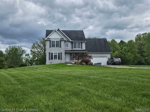 Property Photo:  1451 Ashlyn Court  MI 48836 