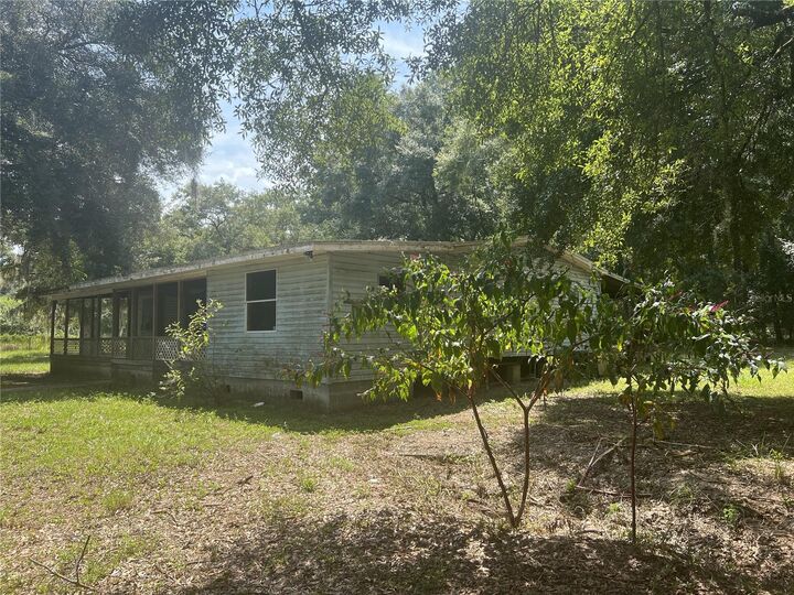 Property Photo: 23848 NE 120th Place FL 32134