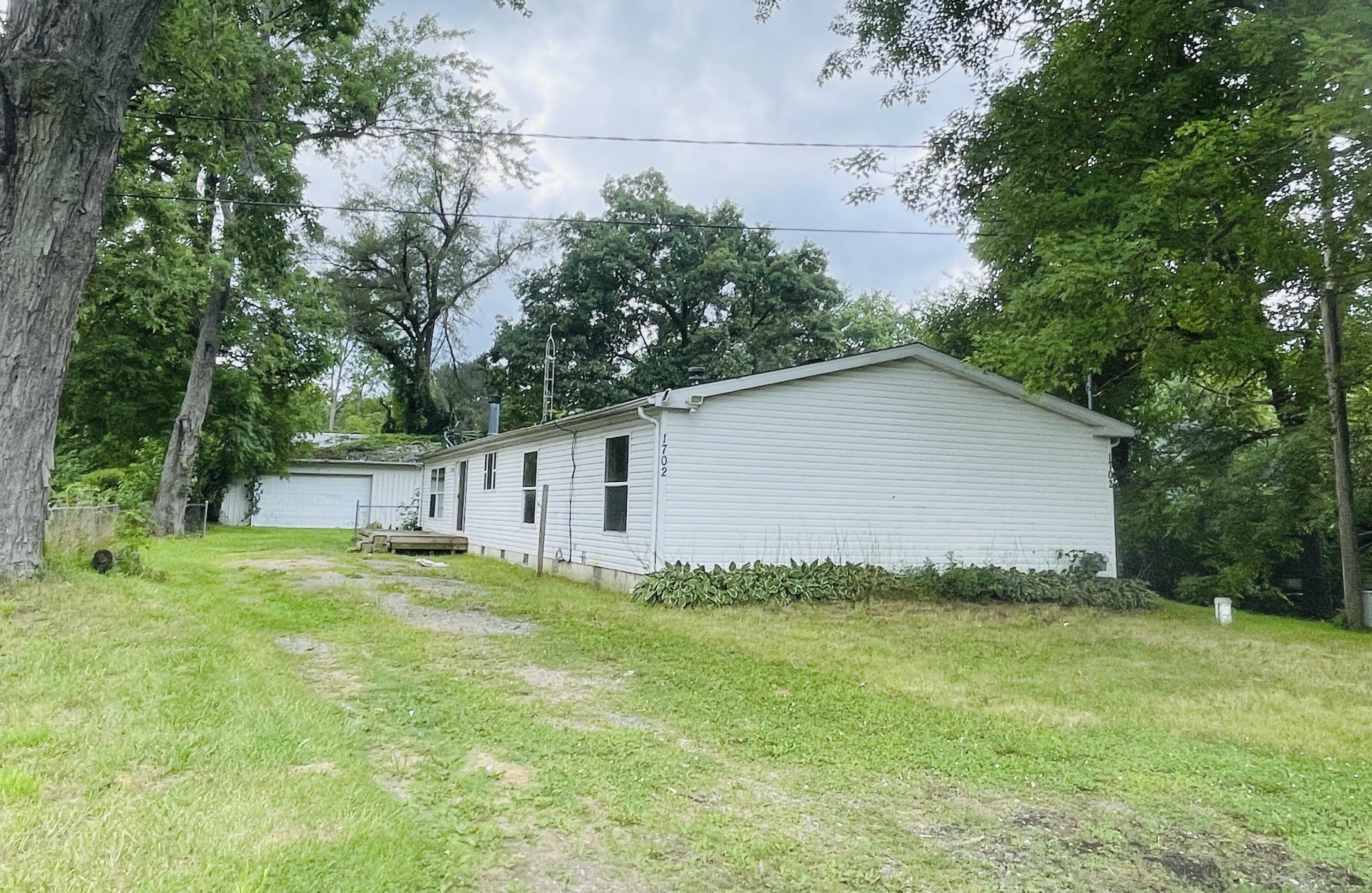 Property Photo:  1702 Munith Road  MI 49201 