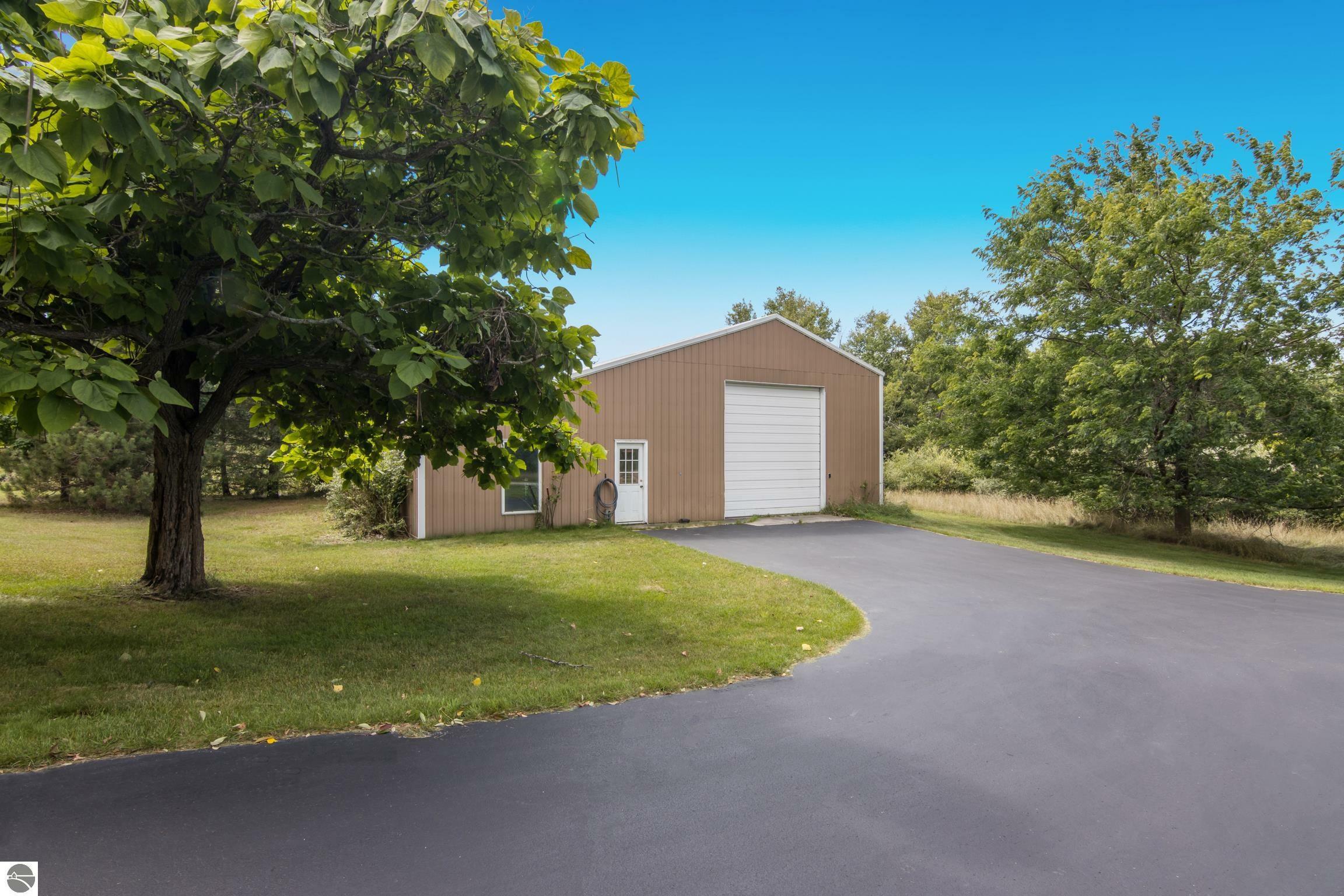 Property Photo:  4792 White Road  MI 49690-9223 