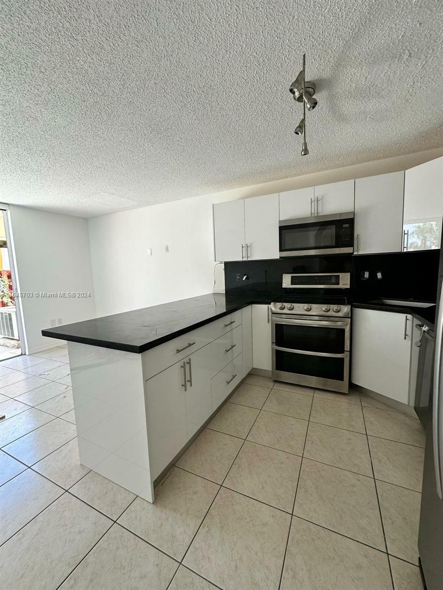 Property Photo:  8701 SW 159th Pl  FL 33193 