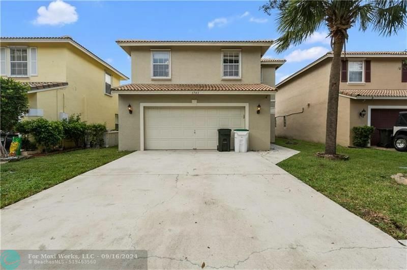 Property Photo:  3743 NW 63rd Ct  FL 33073 