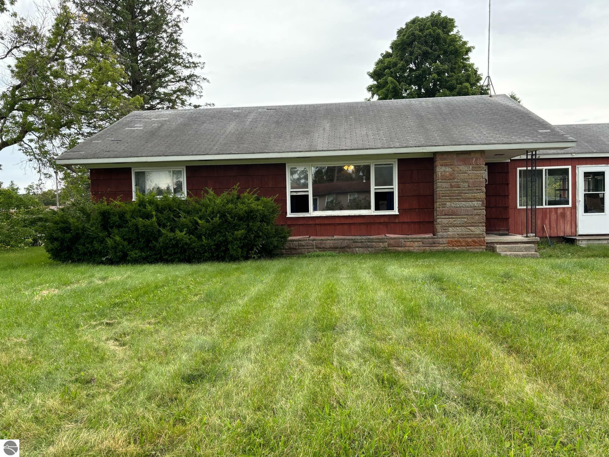 Property Photo:  410 W Hinman  MI 49659 